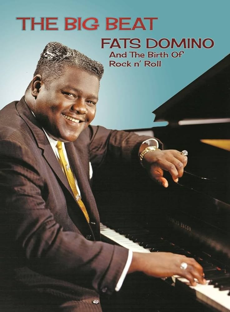 Zdjęcie przedstawiające Fats Domino. InterpretacjePiosenek.pl - Największa baza interpretacji piosenek w Polsce.
