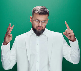 Zdjęcie przedstawiające Kękę. InterpretacjePiosenek.pl - Największa baza interpretacji piosenek w Polsce.