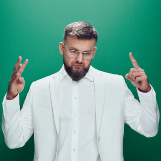 Zdjęcie przedstawiające Kękę. InterpretacjePiosenek.pl - Największa baza interpretacji piosenek w Polsce.