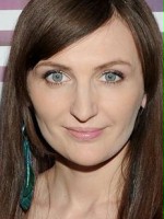 Zdjęcie przedstawiające Reni Jusis. InterpretacjePiosenek.pl - Największa baza interpretacji piosenek w Polsce.