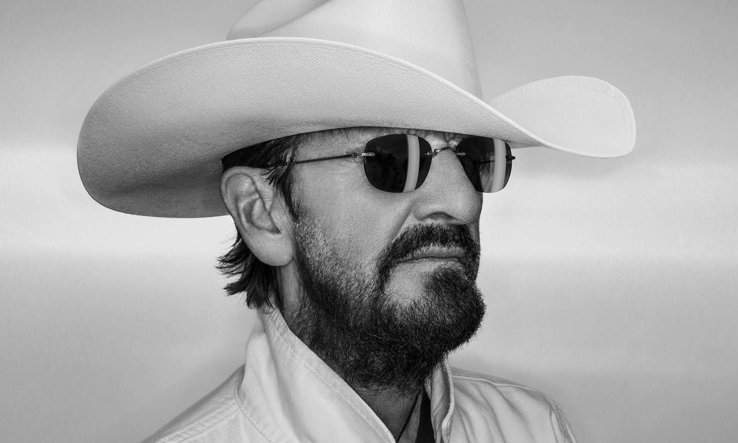 Zdjęcie przedstawiające Ringo Starr. InterpretacjePiosenek.pl - Największa baza interpretacji piosenek w Polsce.