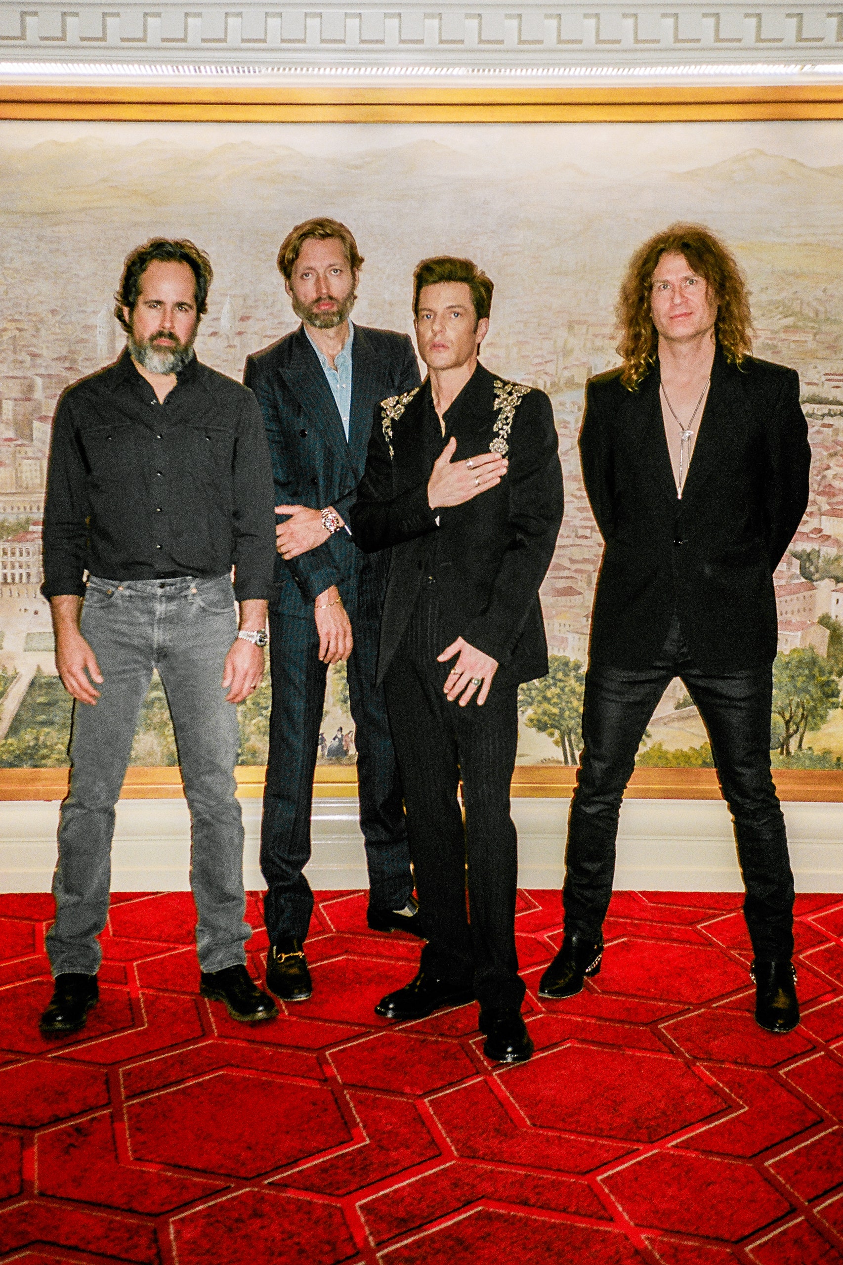 Zdjęcie przedstawiające The Killers. InterpretacjePiosenek.pl - Największa baza interpretacji piosenek w Polsce.