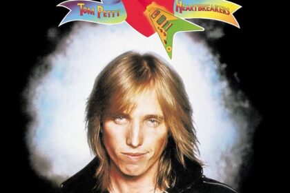 Zdjęcie przedstawiające Tom Petty & The Heartbreakers. InterpretacjePiosenek.pl - Największa baza interpretacji piosenek w Polsce.